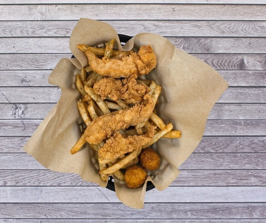 Crispy Hand-Breaded Chicken Tenders in Houston, TX at The Catch